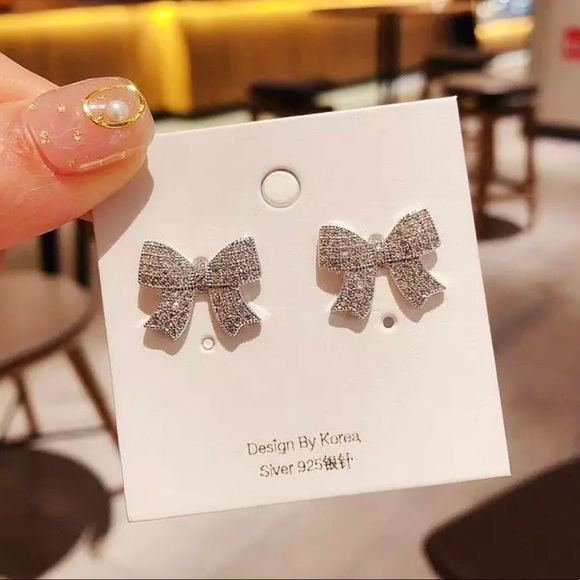 Platinum Plated CZ Crystal Bow Stud Earrings - Picture 2 of 4